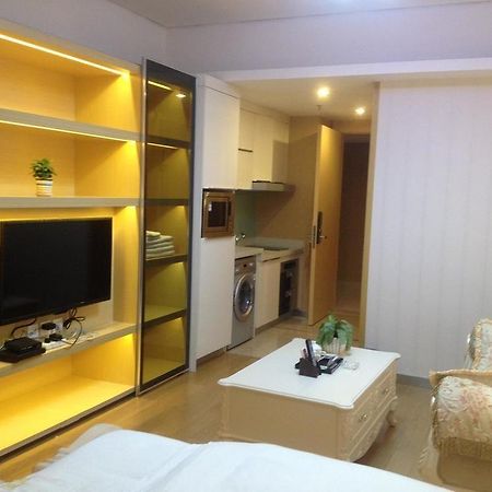 גואנגג'ואו Yichao Apartment Hotel מראה חיצוני תמונה
