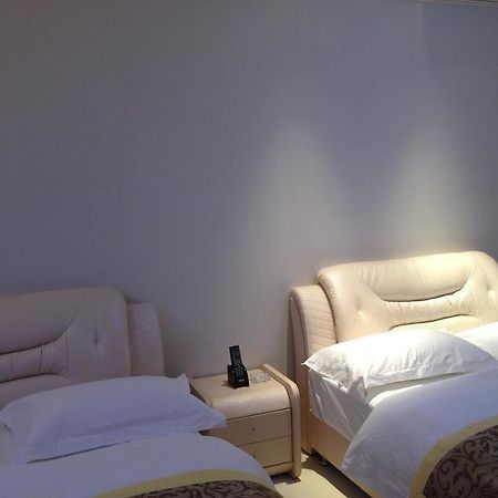 גואנגג'ואו Yichao Apartment Hotel מראה חיצוני תמונה