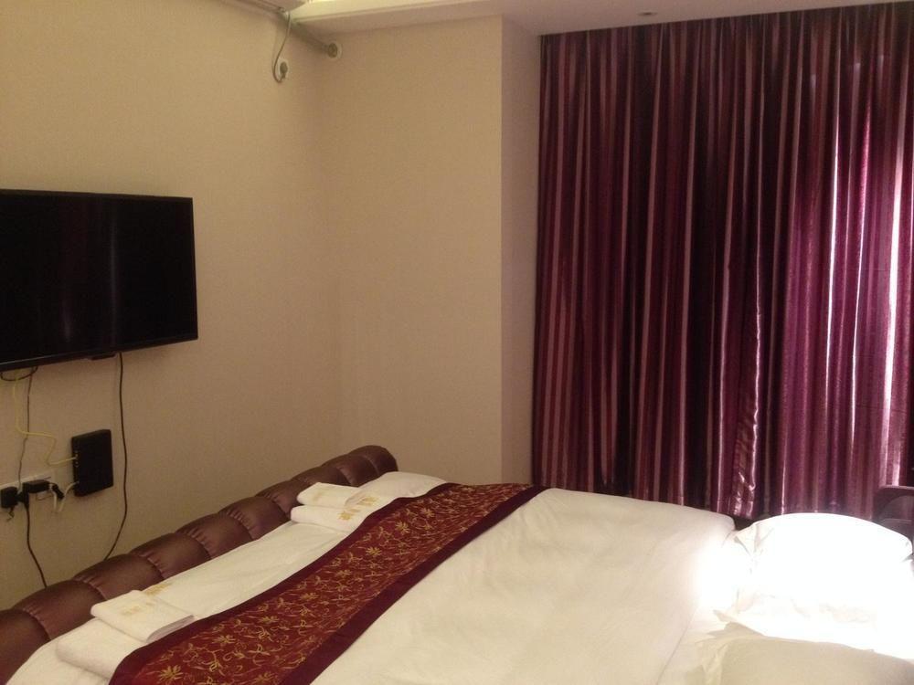 גואנגג'ואו Yichao Apartment Hotel מראה חיצוני תמונה